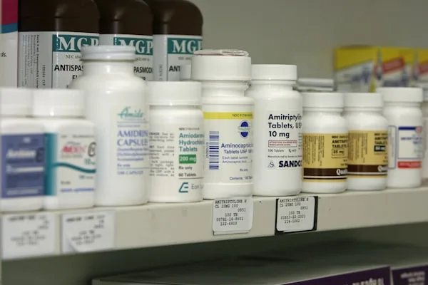 Pharmacy shelf stocked with medication